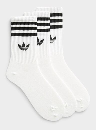 Les chaussettes c&ocirc;tel&eacute;es rayures noires et blanches Emballage de 3