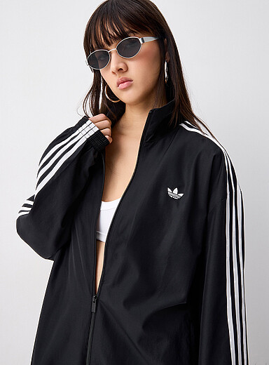 La longue veste <i>track</i> rayures