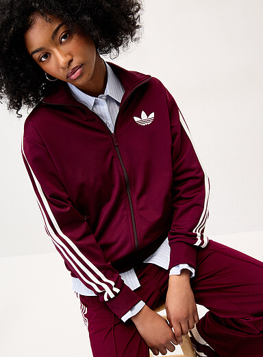 La veste <i>track</i> tricot col montant