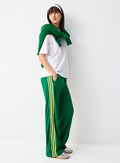 Adidas: Le pantalon <i>track</i> large 3 bandes Vert irlandais - &Eacute;meraude pour femme