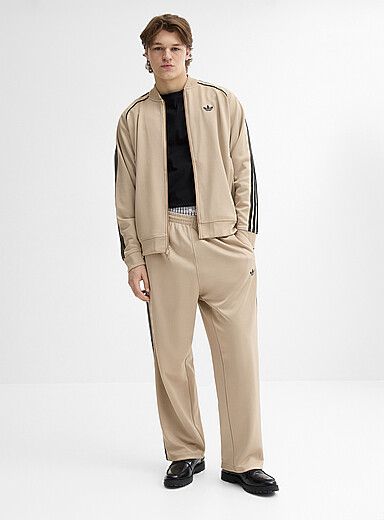 Adidas Originals: Le pantalon <i>track</i> Adicolor <b>Coupe ample</b> Brun clair pour homme