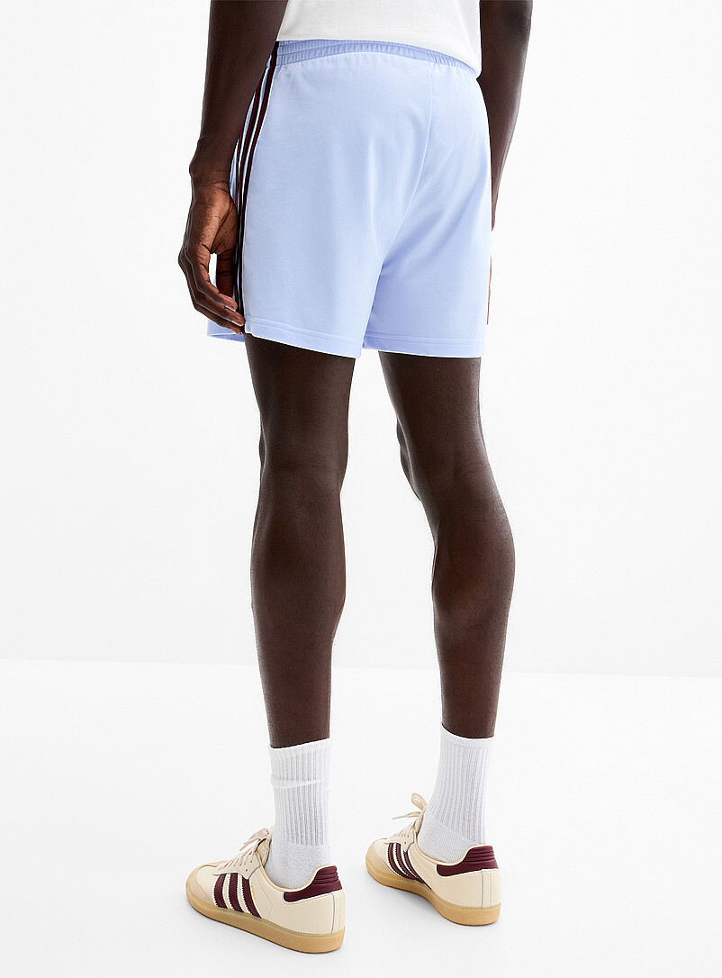 Adidas Originals: Le short <i>track</i> Firebird Noir pour homme