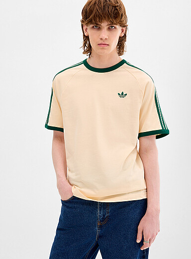 Le t-shirt lis&eacute;r&eacute; trois bandes