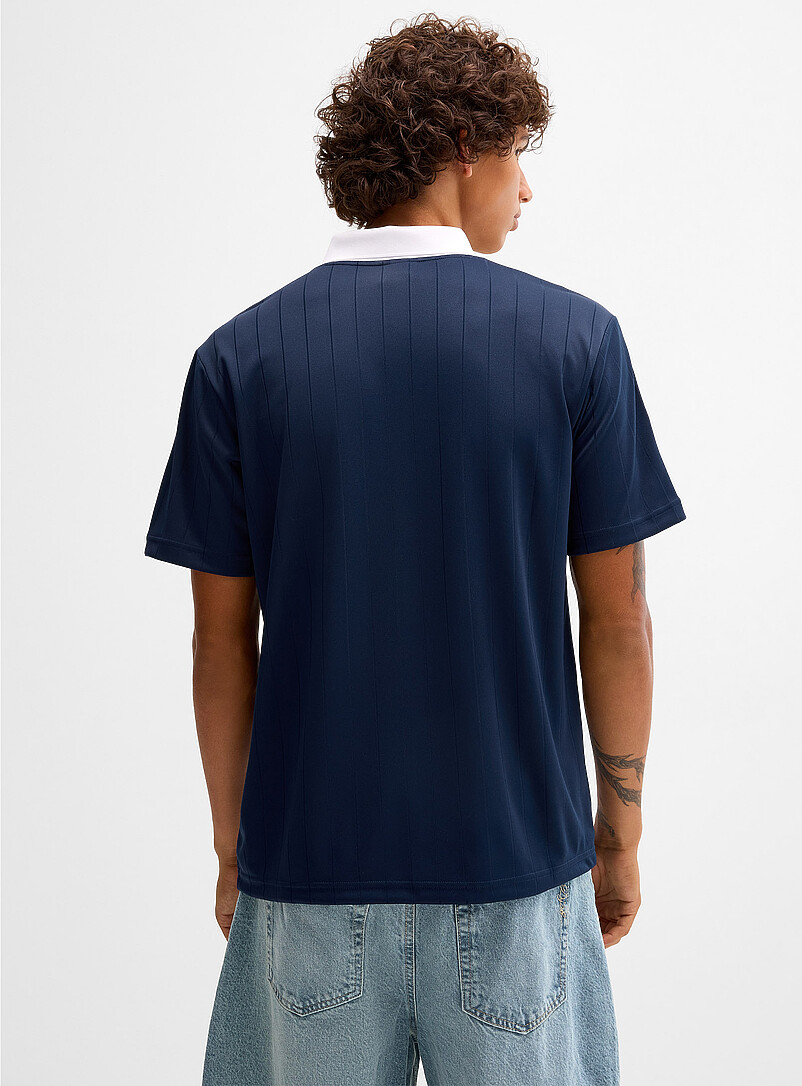 Adidas Originals: Le polo de soccer Adicolor rayures verticales Bleu fonc&eacute; - Indigo pour homme