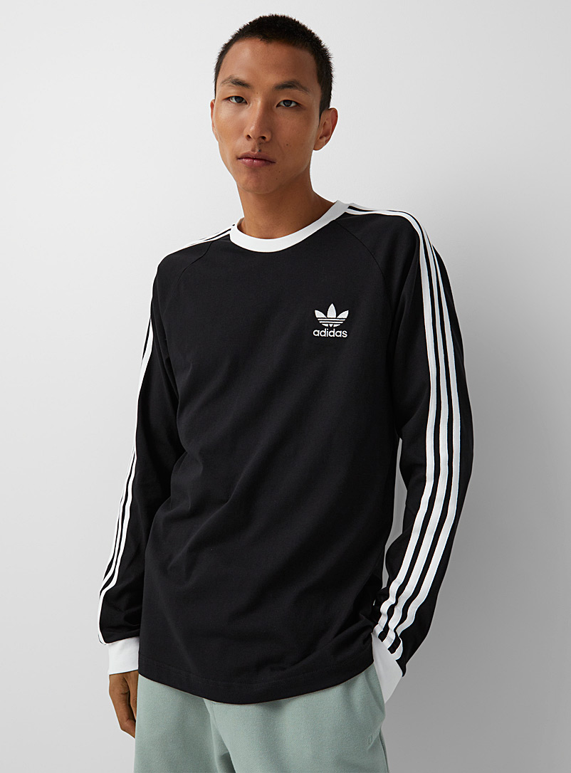 Adidas Originals: Le t-shirt bandes iconiques Noir pour homme