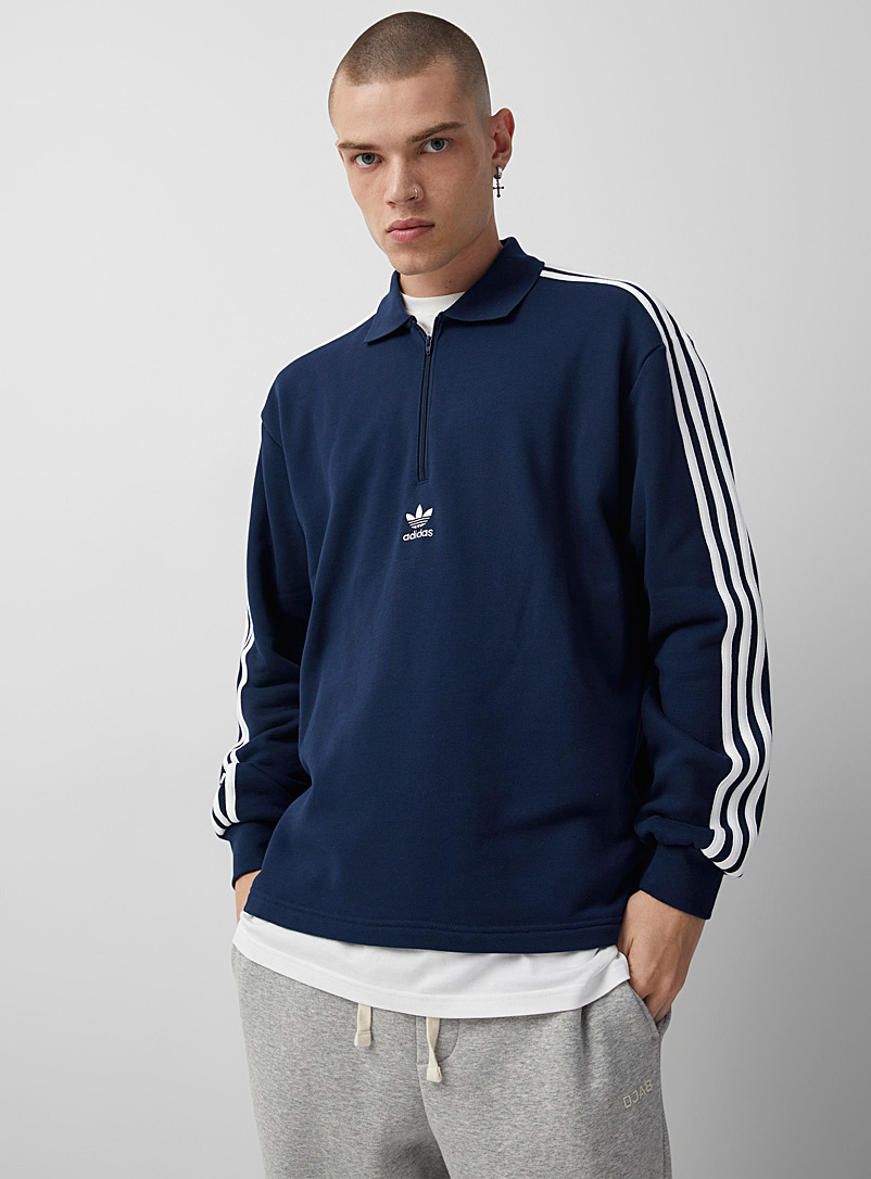 Adidas Originals: Le polo col zippé Adicolor Bleu foncé pour homme
