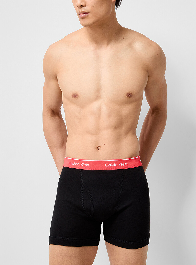 Calvin Klein: Les boxeurs longs tout confort extensibles 4 po Coton Emballage de 3 Noir &agrave; motifs pour homme