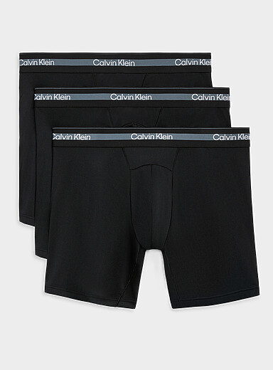 Calvin Klein: Les boxeurs longs Icon Active 5 po Emballage de 3 Noir pour homme
