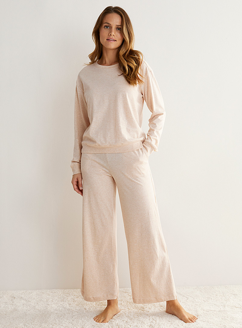 Calvin Klein: Le pantalon détente signature jambe large Beige crème pour femme