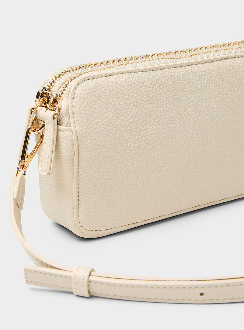Simons: Le sac bandouli&egrave;re minimaliste double compartiment Noir pour femme