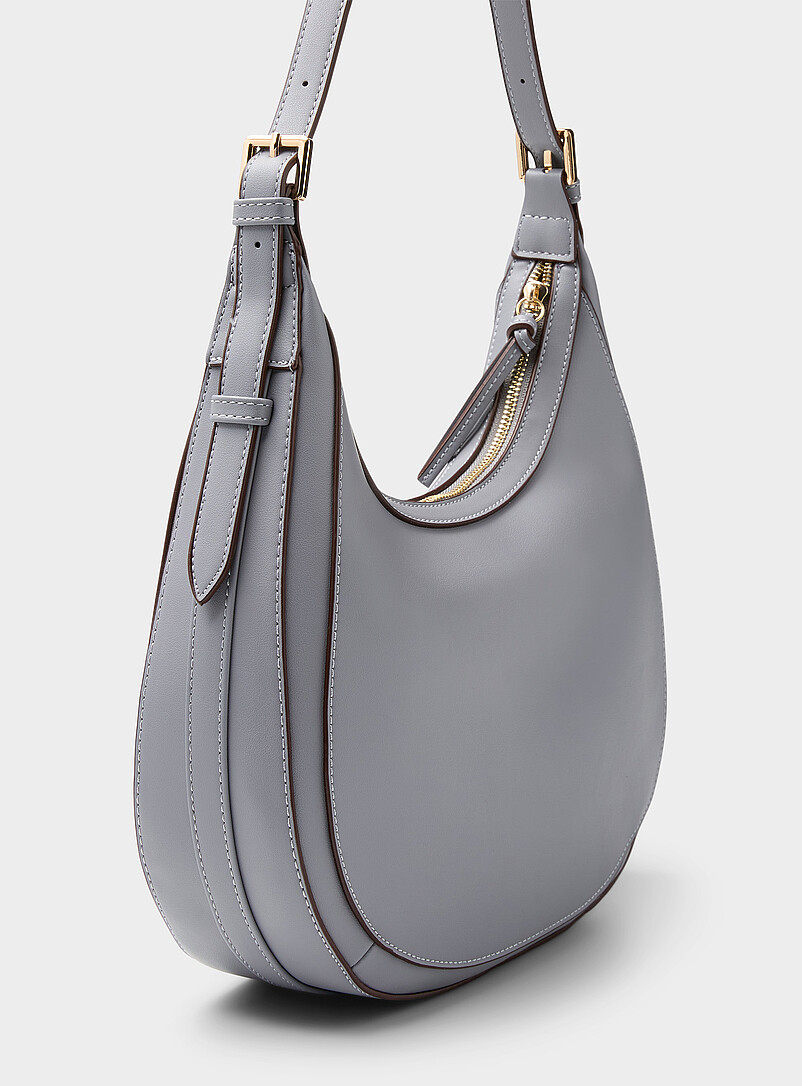 Simons: Le sac besace arrondi uni Noir pour femme