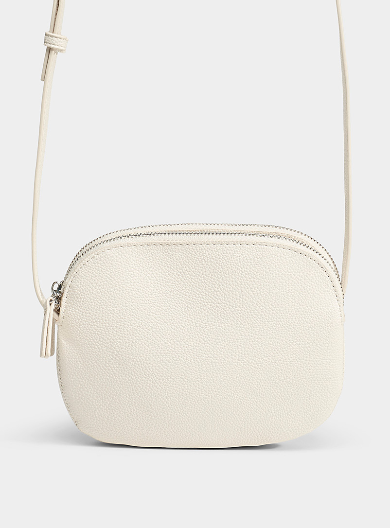 Simons Cream Beige Pebbled oval shoulder bag for women