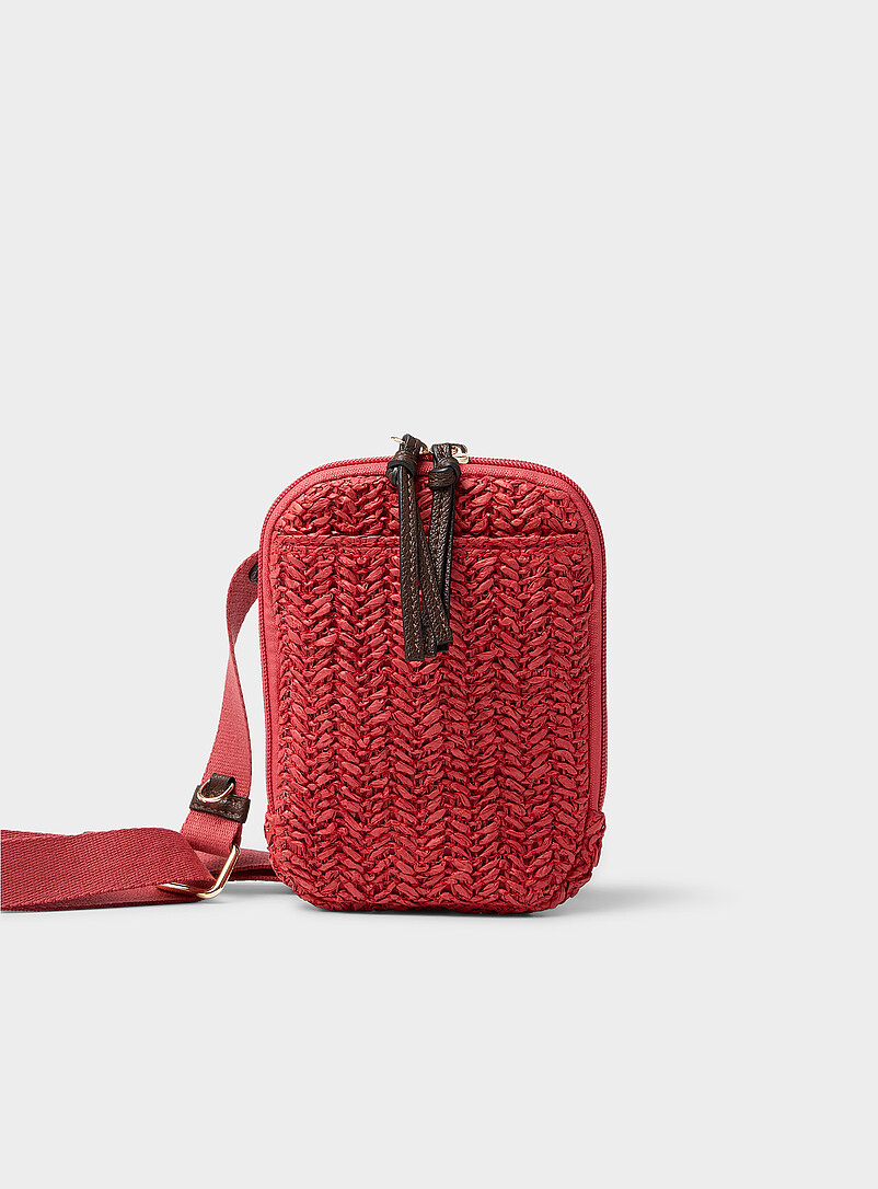 Braided straw phone clutch product image (primary)