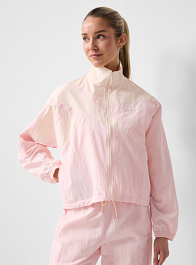 La veste de surv&ecirc;tement rose Vecto