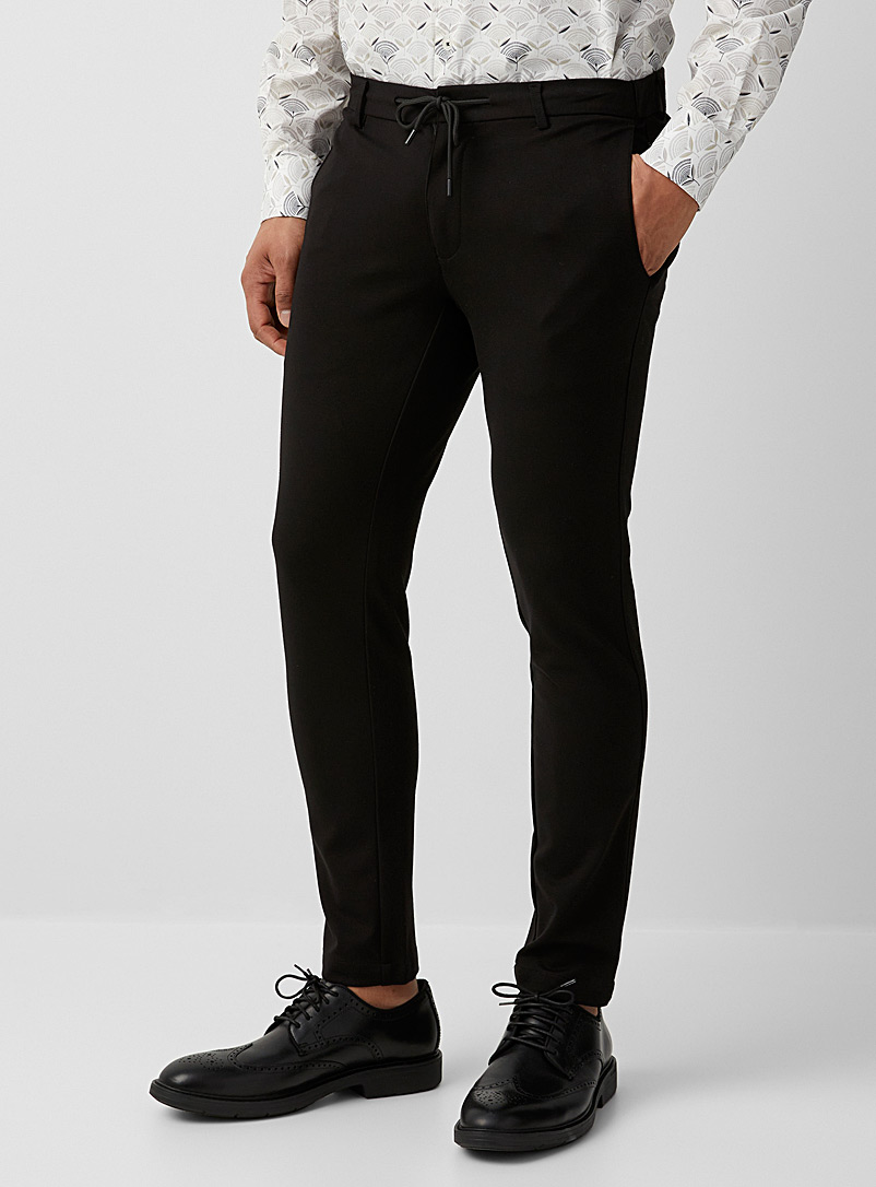 Hörst: Le pantalon hybride noir Noir pour homme