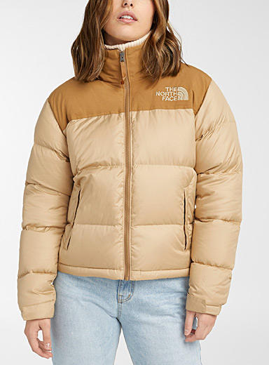 light brown north face jacket
