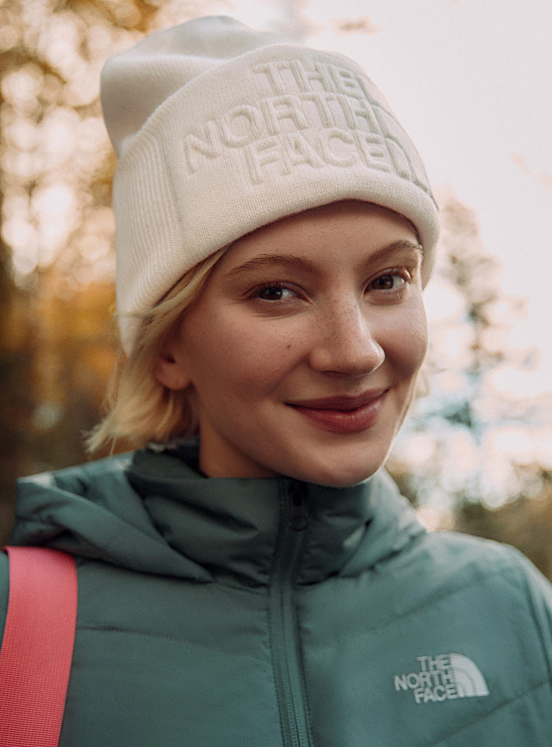 The North Face Ivory White Embossed logo oversized cuff tuque for women