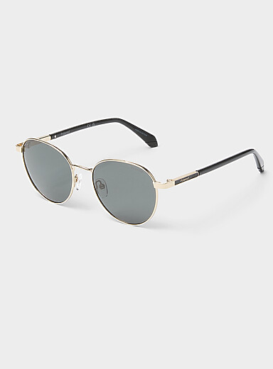 Les lunettes de soleil rondes accents m&eacute;talliques polaris&eacute;es