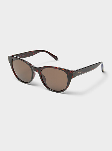 Les lunettes de soleil rondes &eacute;pur&eacute;es