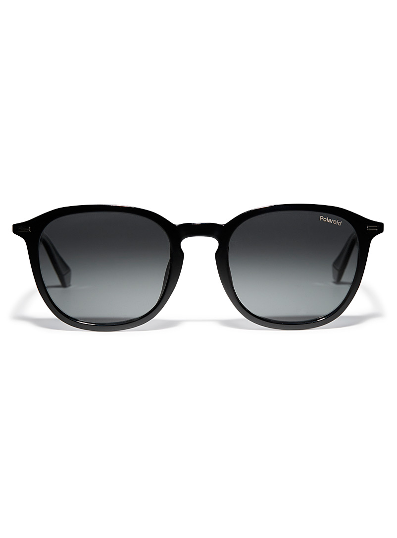 Polaroid: Les lunettes de soleil rondes minimalistes Noir pour homme