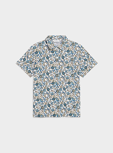 Contemporaine: Le polo jersey extensible &agrave; motif Blanc &agrave; motifs pour femme