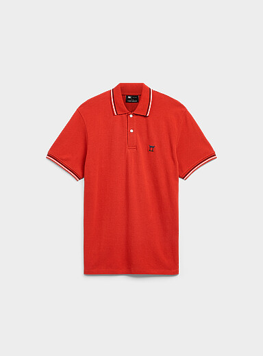 Le polo piqu&eacute; motif brod&eacute;
