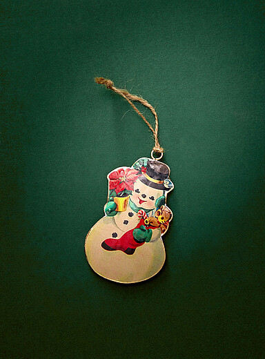 L'ornement m&eacute;tallique bonhomme de neige <b>Collection de No&euml;l</b>