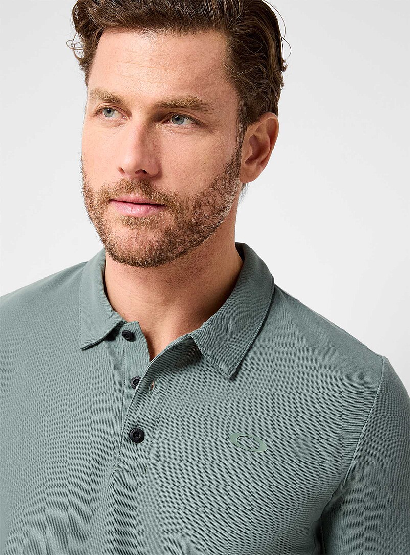 Oakley: Le polo piqu&eacute; uni essentiel Vert pour homme