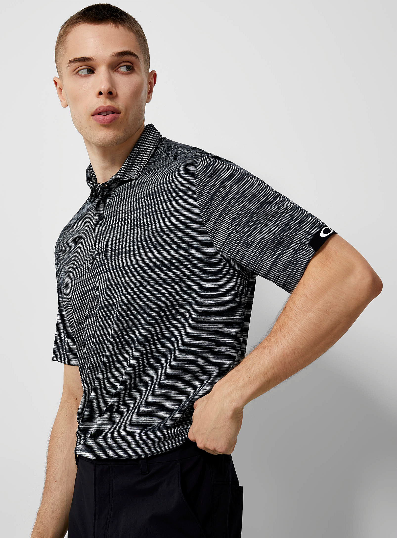 Oakley Gravity Heathered Microfibre Golf Polo In Charcoal
