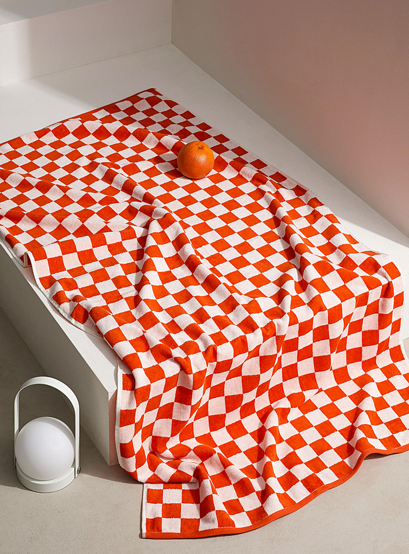 Simons Maison: La serviette de plage coton bio damier 86 x 160 cm Orange à motifs