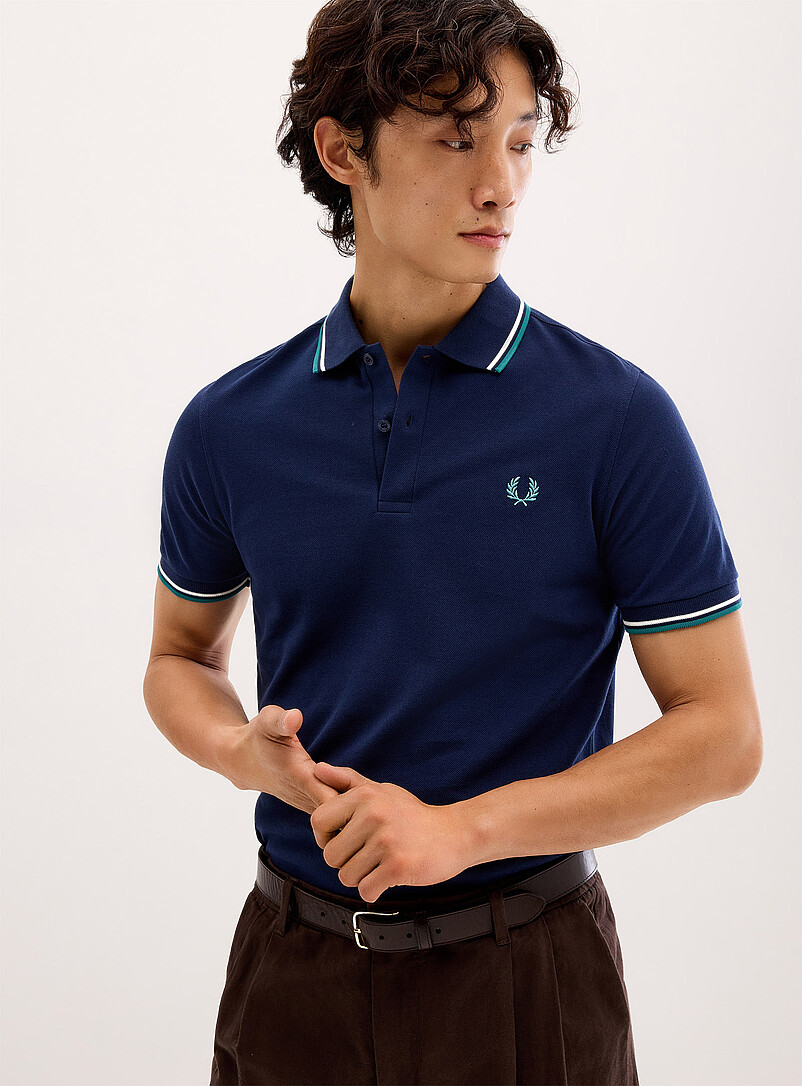 Fred Perry: Le polo piqu&eacute; Perry couleurs estivales Bleu p&acirc;le - Bleu ciel pour homme