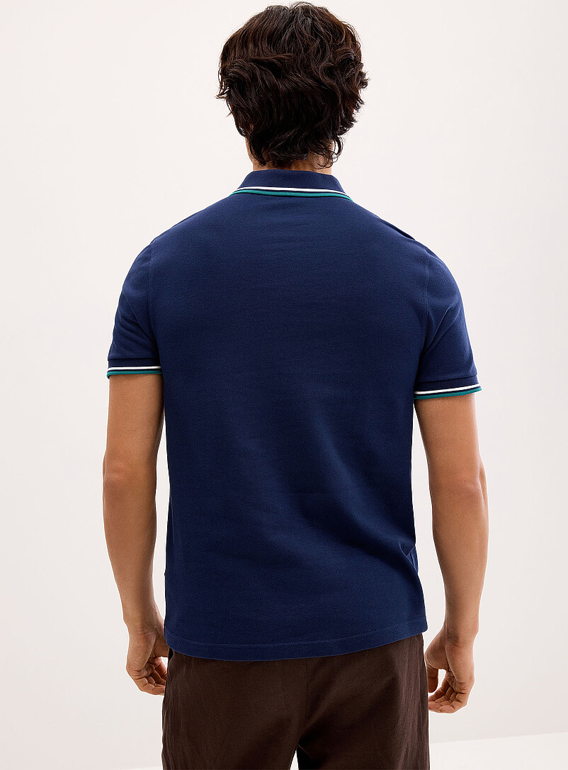 Fred Perry: Le polo piqu&eacute; Perry couleurs estivales Bleu p&acirc;le - Bleu ciel pour homme