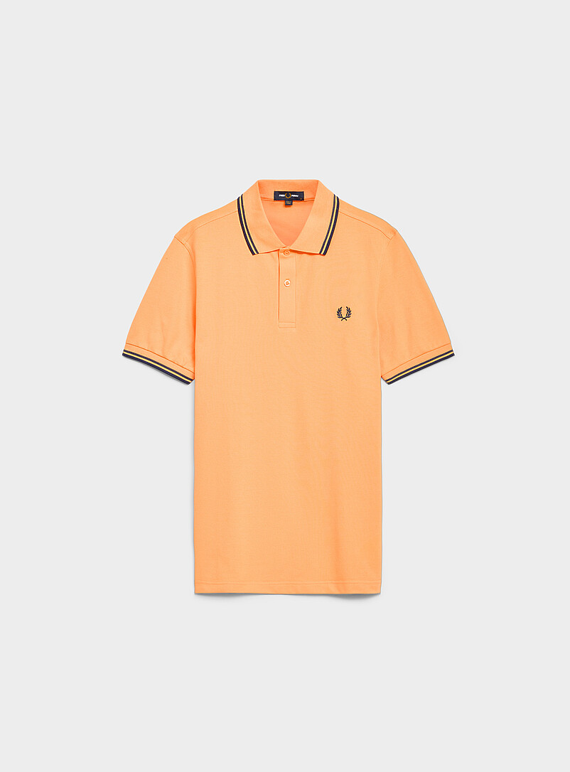 Fred Perry: Le polo piqu&eacute; Perry couleurs estivales Bleu p&acirc;le - Bleu ciel pour homme