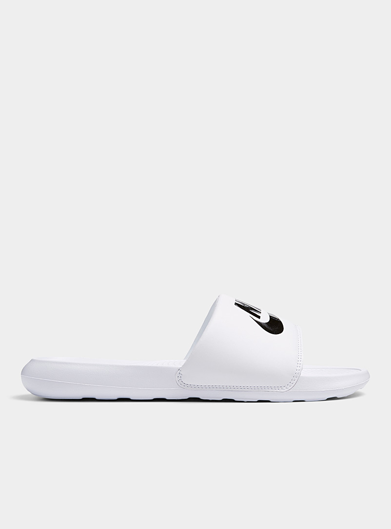 Nike: La sandale slide Victori One Homme Blanc et noir pour homme