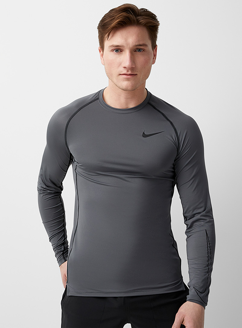 Nike: Le t-shirt seconde peau Core Pro Gris pour homme