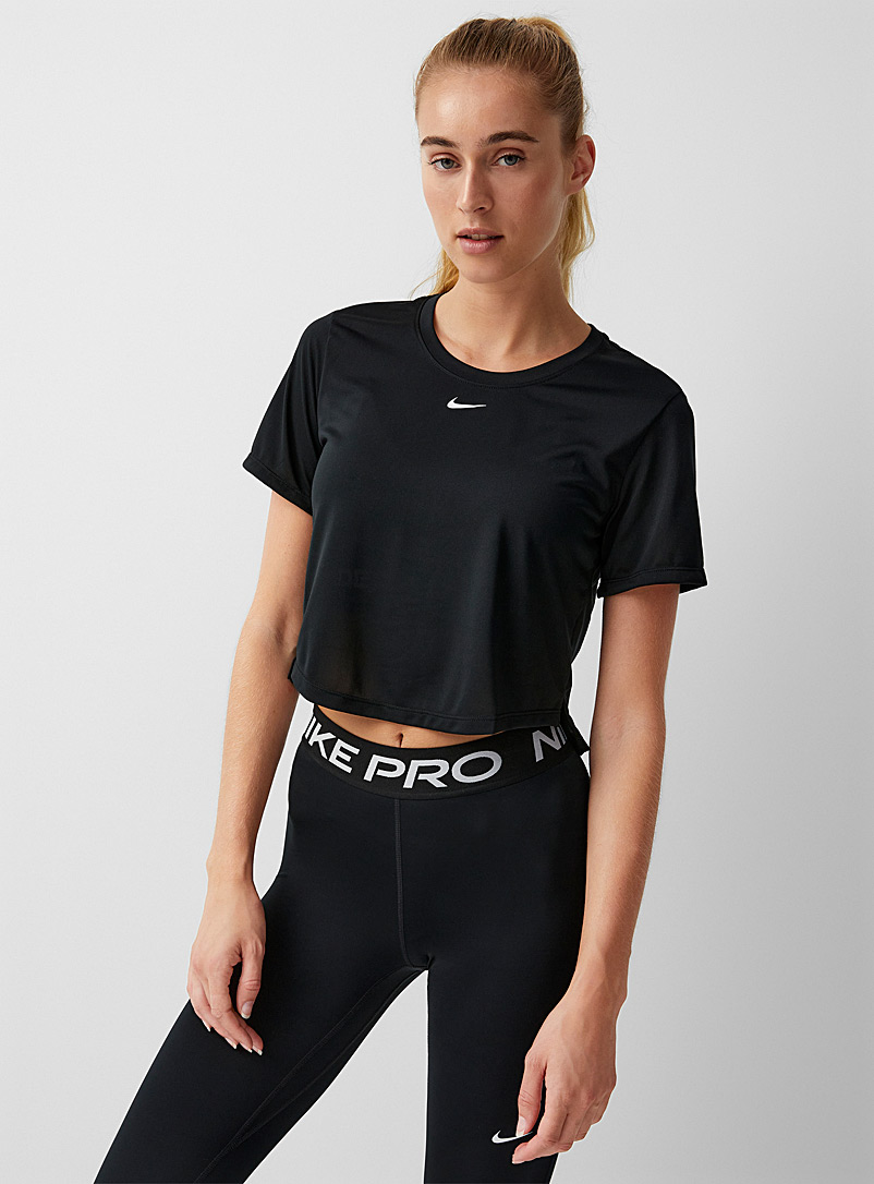 Nike: Le t-shirt court minilogo Swoosh Noir pour femme