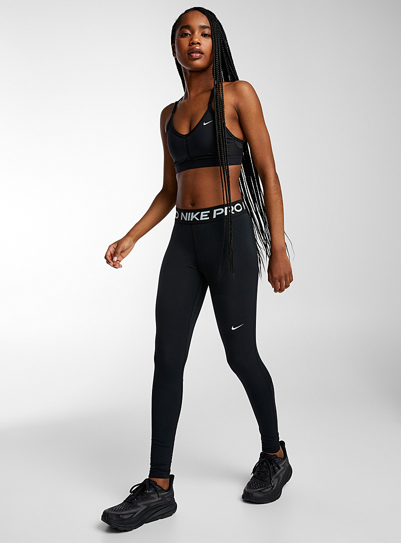 Legging de fitness pour femme en noir avec filet