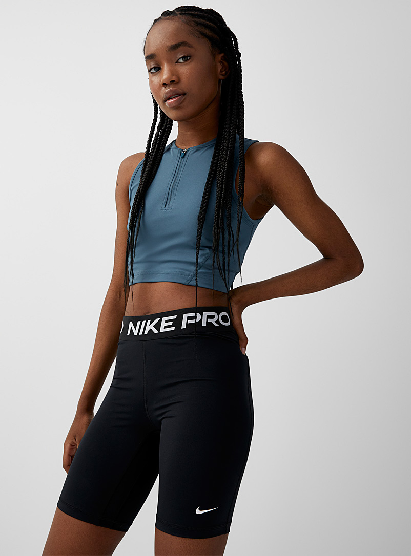 Nike: La camisole demi-zip dos microperforé Bleu moyen-ardoise pour femme
