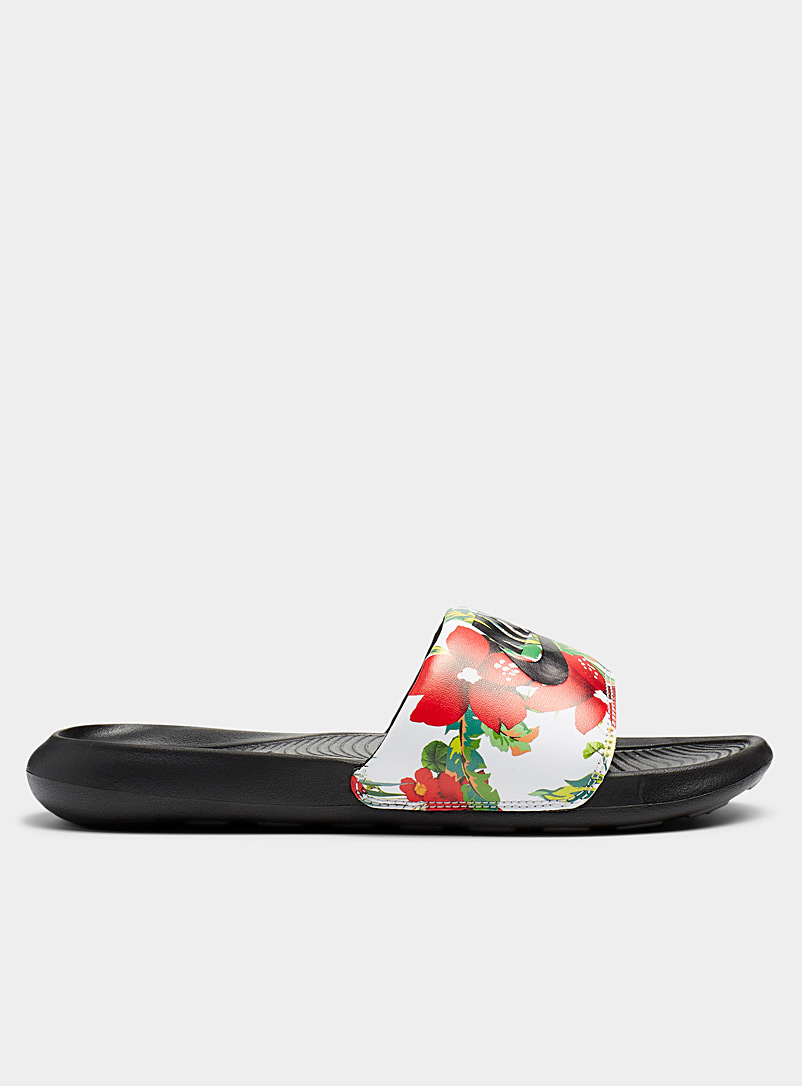 Nike: La sandale slide Victori One hibiscus Femme Blanc à motifs pour femme