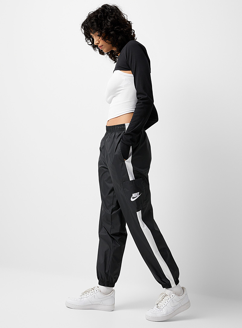 Nike: Le jogger bandes blanches Noir pour femme