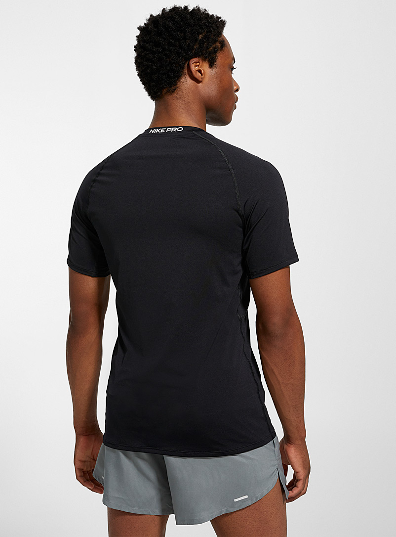 Nike: Le t-shirt ajust&eacute; raglan logo Pro Blanc pour homme