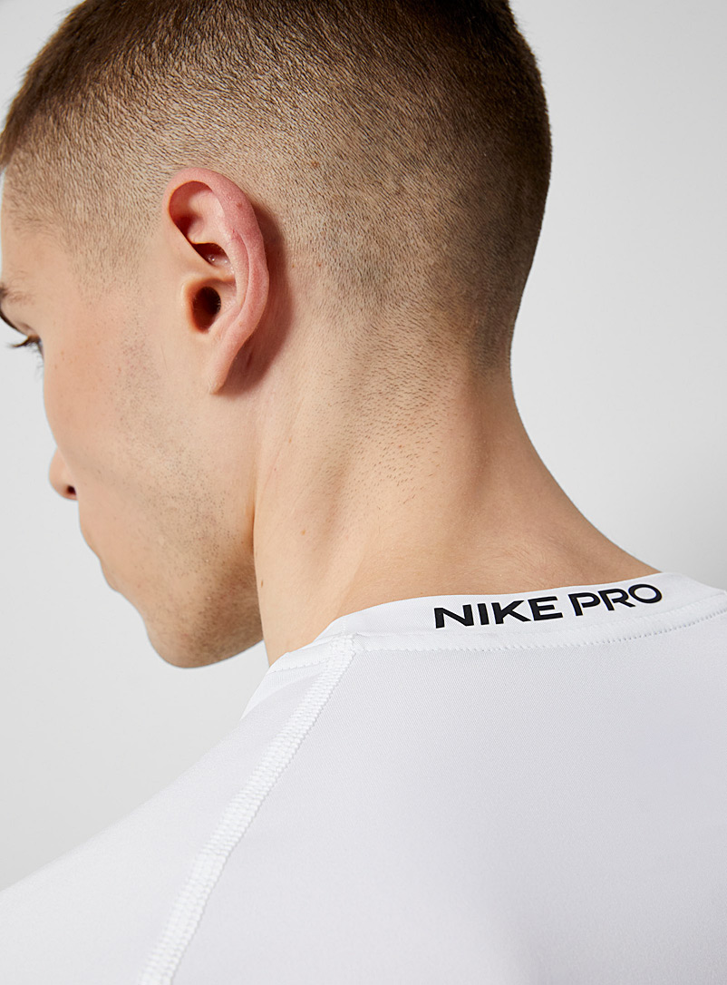 Nike: Le t-shirt ajust&eacute; raglan logo Pro Blanc pour homme