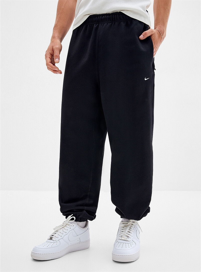 Nike Grey Solo Swoosh fleece joggers <b>Relaxed fit</b> for men