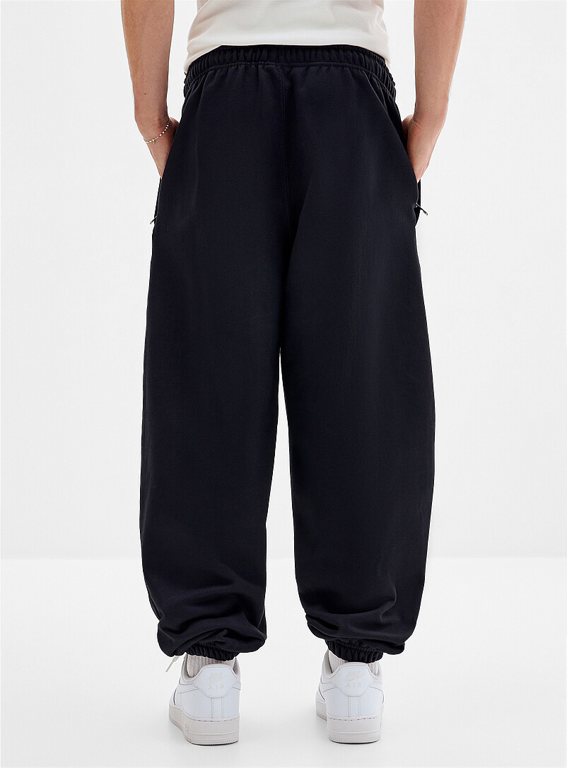 Nike Grey Solo Swoosh fleece joggers <b>Relaxed fit</b> for men
