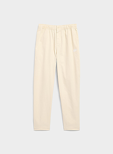 Nike Beige Sportswear Club woven pant <b>Tapered fit</b> for men