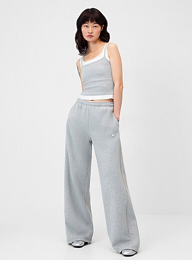 Nike: Le pantalon sweat uni Studio Gris pour femme