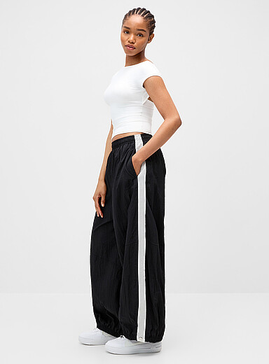 Nike Black Crocheted-style trim track pant <b>Fit: Loose leg, high rise</b> for women