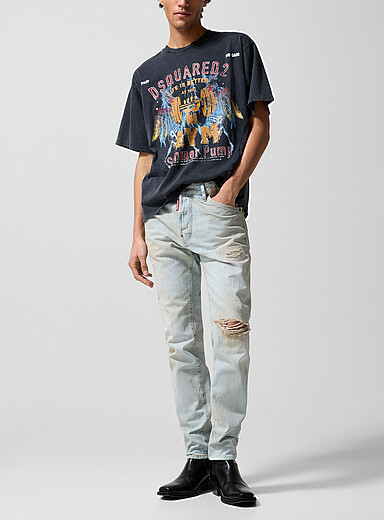 Dsquared2: Le jean ajust&eacute; d&eacute;lav&eacute; &agrave; trous Teddy Bleu pour homme