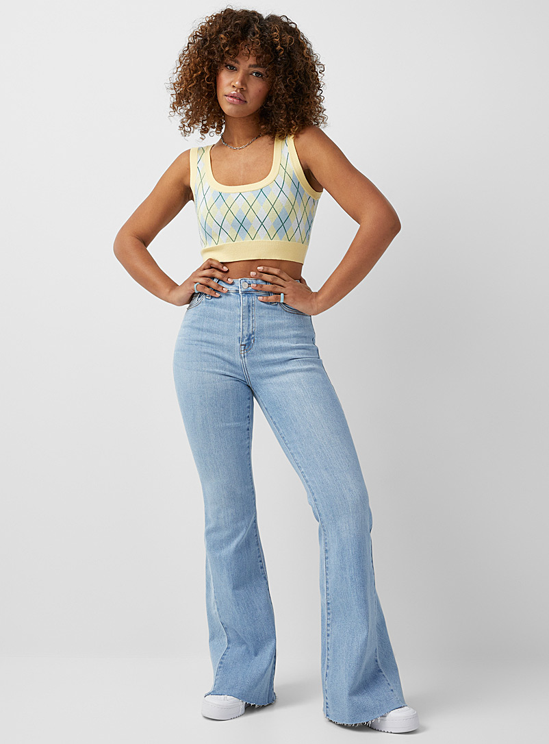 Twik Blue Scissor-cut edge flared jeans for women