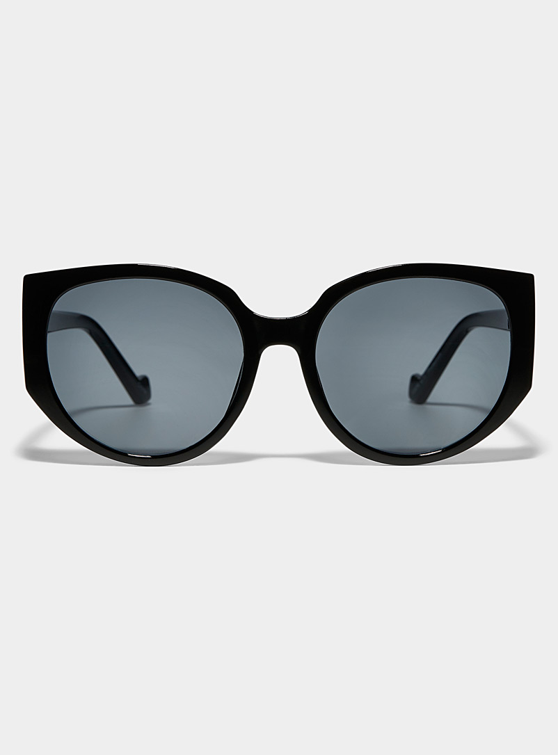 Simons: Les lunettes de soleil rondes anguleuses Noir pour femme